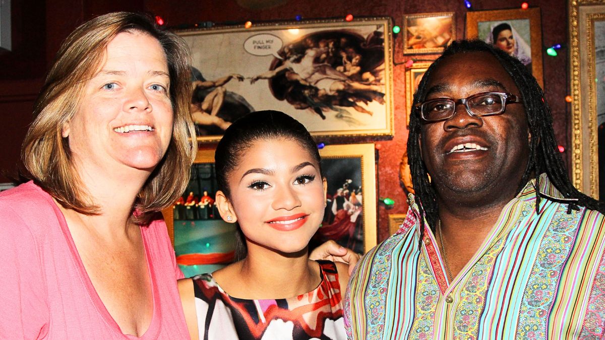 (L-R) Claire Stoermer, daughter Zendaya Coleman and father Kazembe Ajamu Coleman visit Buca di Beppo Times Square on July 15, 2013 in New York City. 