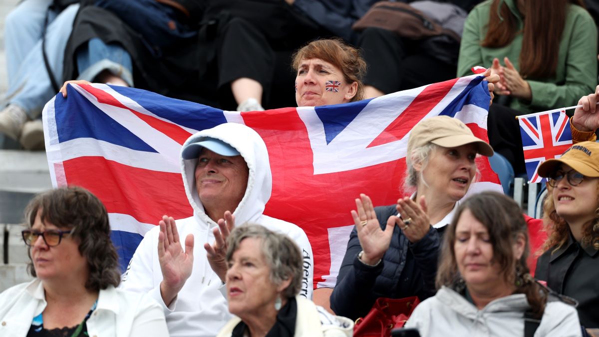 Fans of Team Great Britain show their support as they watch Tom McEwen and horse JL Dublin of Team Great Britain compete in the Eventing Individual Dressage leg on day one of the Olympic Games Paris 2024 at Chateau de Versailles on July 27, 2024 in Versailles, France. (Photo by Kevin C. Cox/Getty Images)