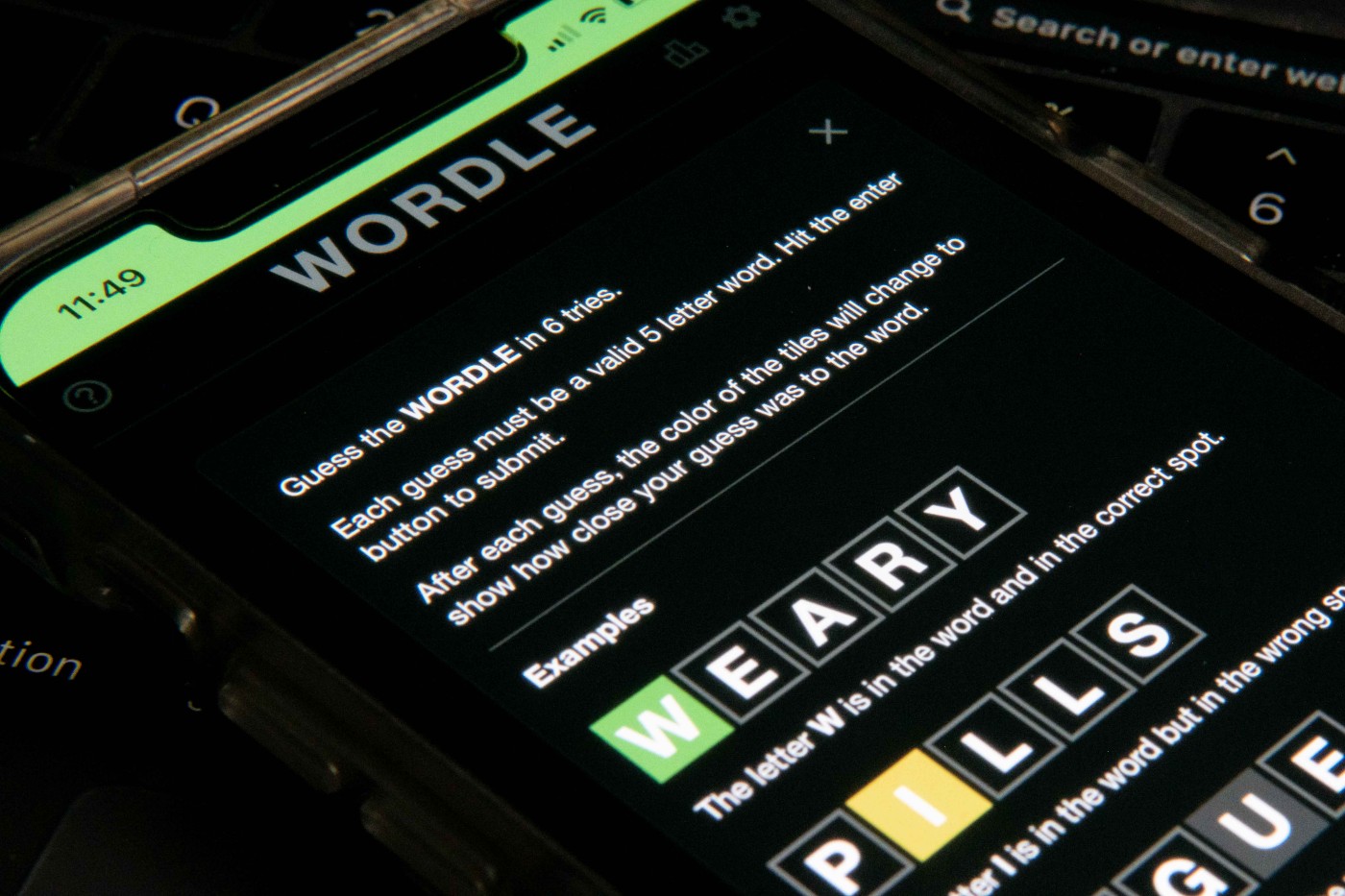 Worldle, the word-guessing game, is shown open on a phone.