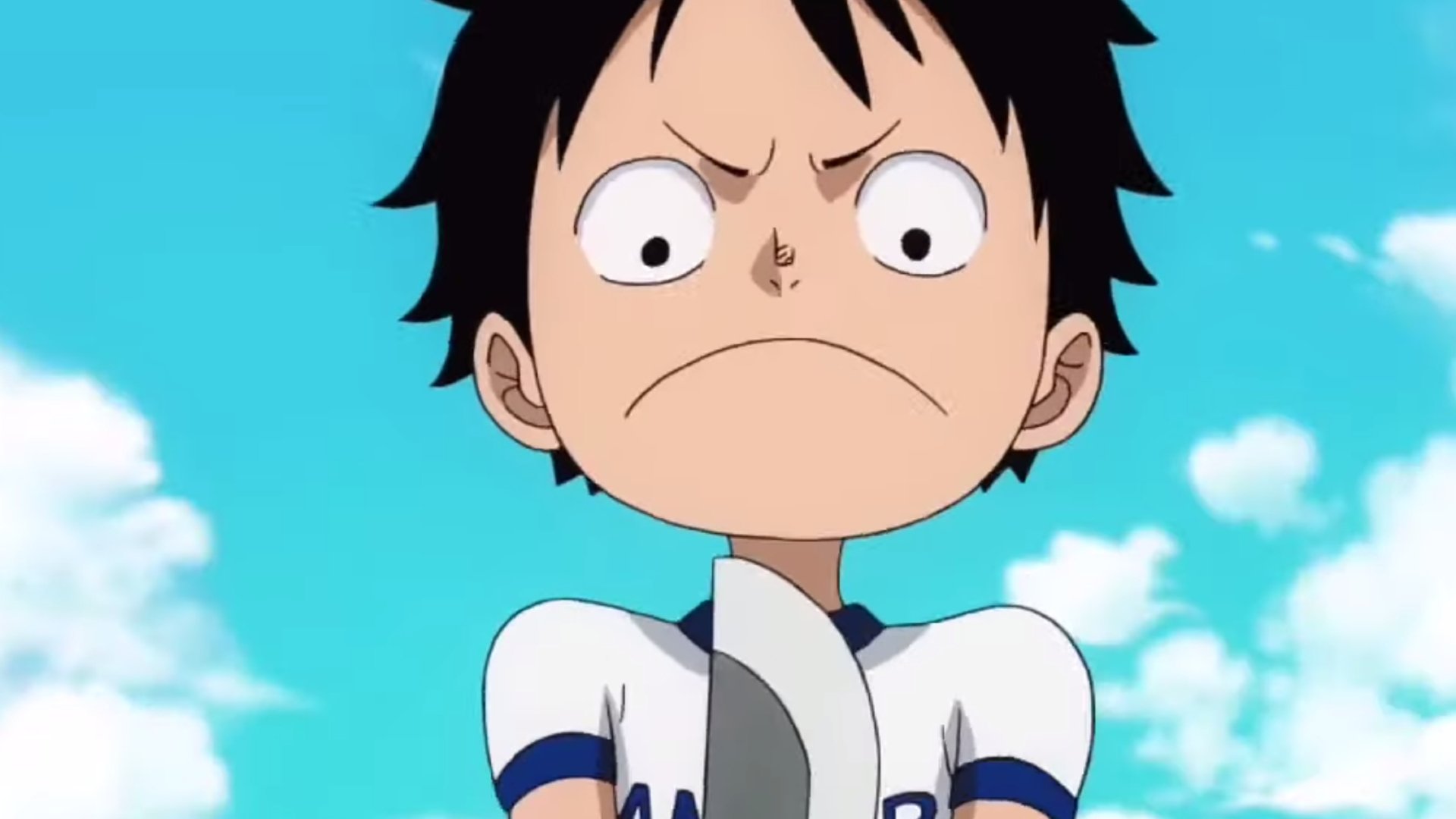 Luffy is seen as a child looking upset in One Piece.