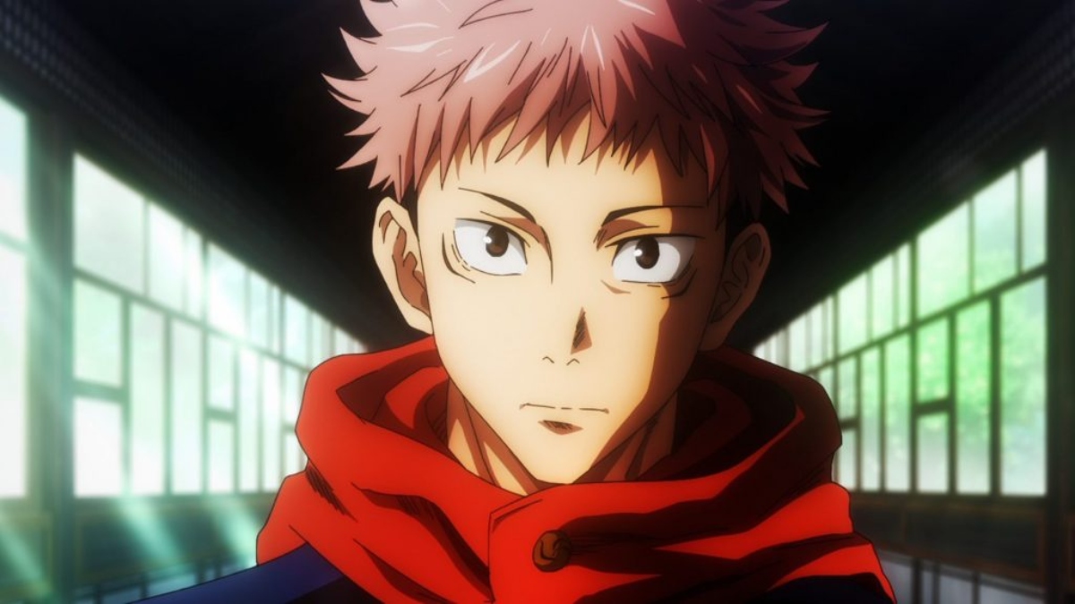 Yuji Itadori looking serious in the season 1 opening of Jujutsu Kaisen