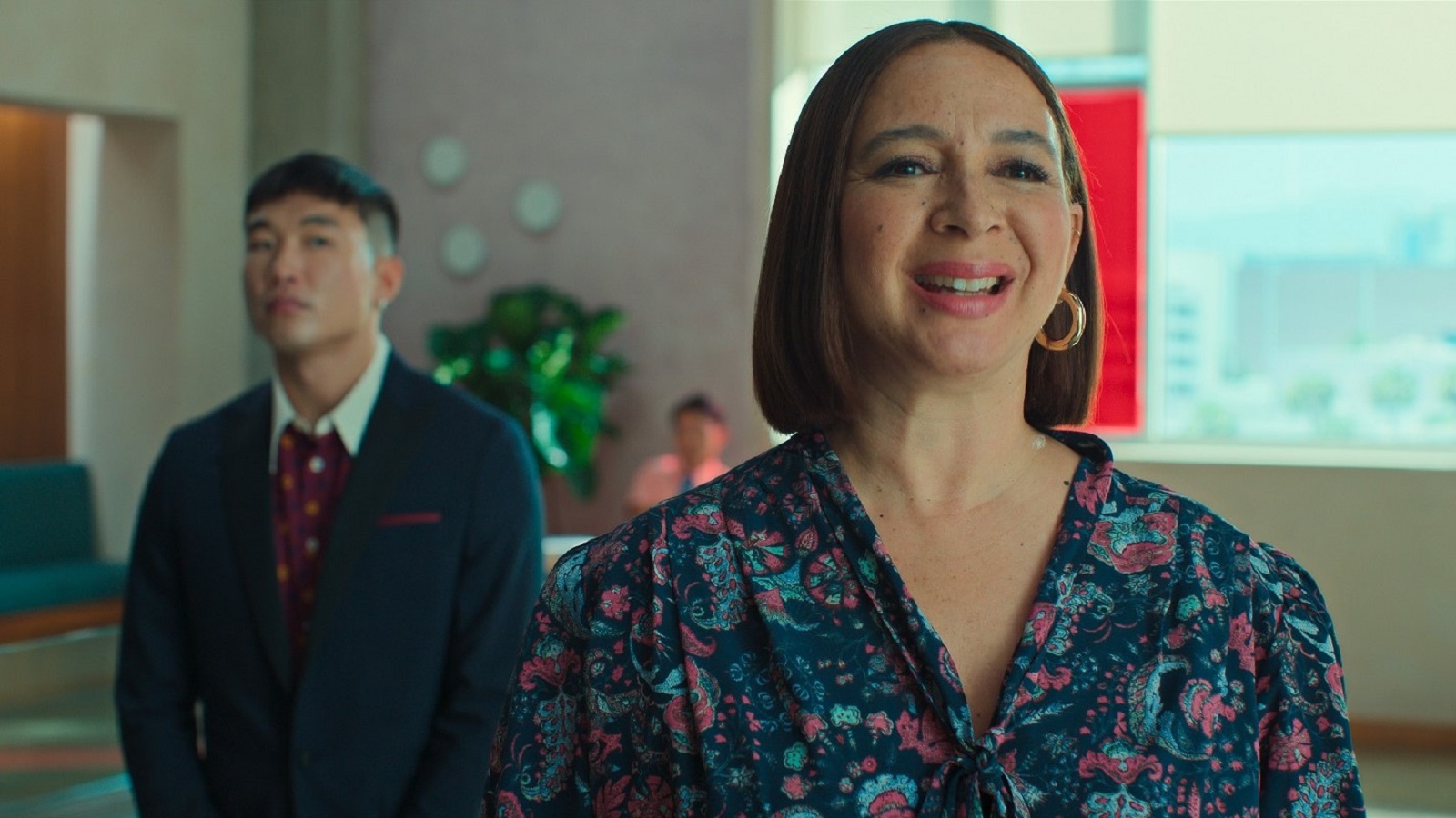 Nicholas (Joel Kim Booster) and Molly Novak (Maya Rudolph) in Loot (Apple)