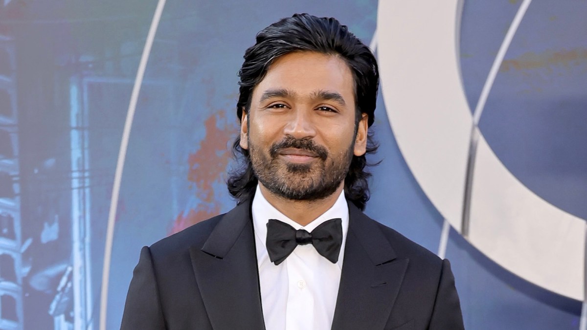 HOLLYWOOD, CALIFORNIA - JULY 13: Dhanush attends the World Premiere of Netflix's "The Gray Man" at TCL Chinese Theatre on July 13, 2022 in Hollywood, California.