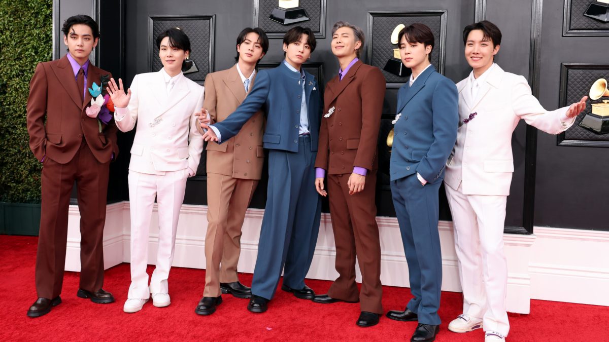 The Korean superstars BTS pose for a photo wearing suits at the Grammys