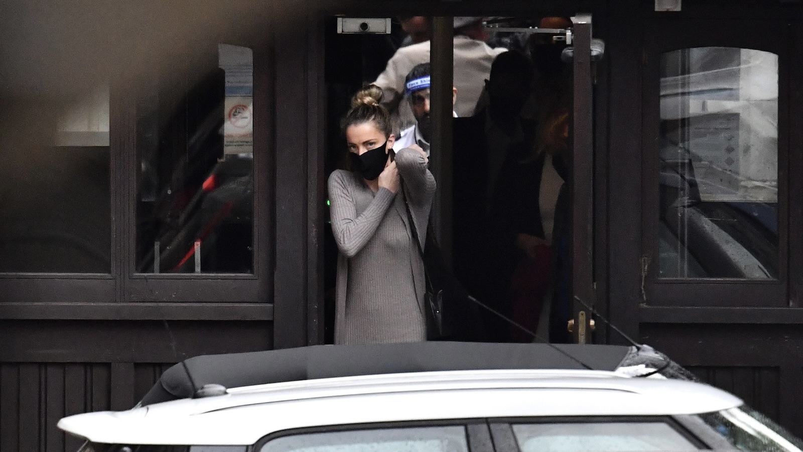 LONDON, ENGLAND - JULY 27: Whitney Henriquez, sister of Amber Heard, arrives at the Royal Courts of Justice, the Strand on July 27, 2020 in London, England. The Hollywood actor is suing News Group Newspapers (NGN) and the Sun's executive editor, Dan Wootton, over an article published in 2018 that referred to him as a "wife beater" during his marriage to actor Amber Heard.