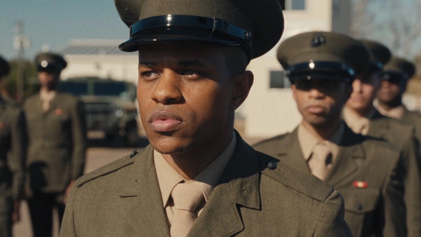 Men in military uniforms line up in The Inspection