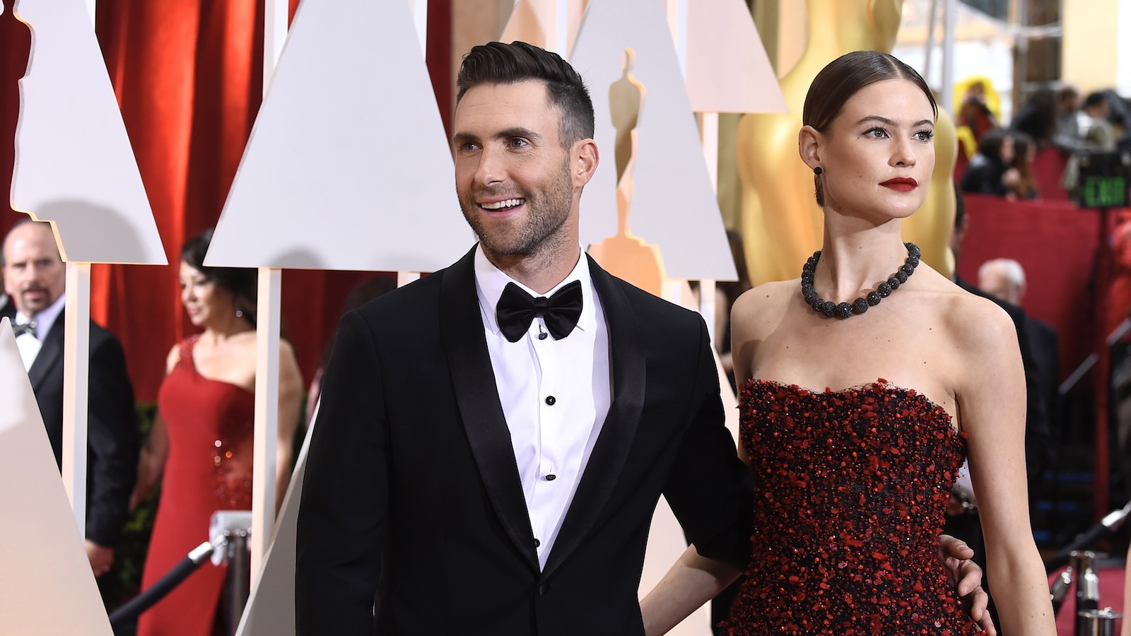 Adam Levine and Behati Prinsloo attend the 87th Annual Academy Awards at Hollywood & Highland Center on February 22, 2015 in Hollywood, California.