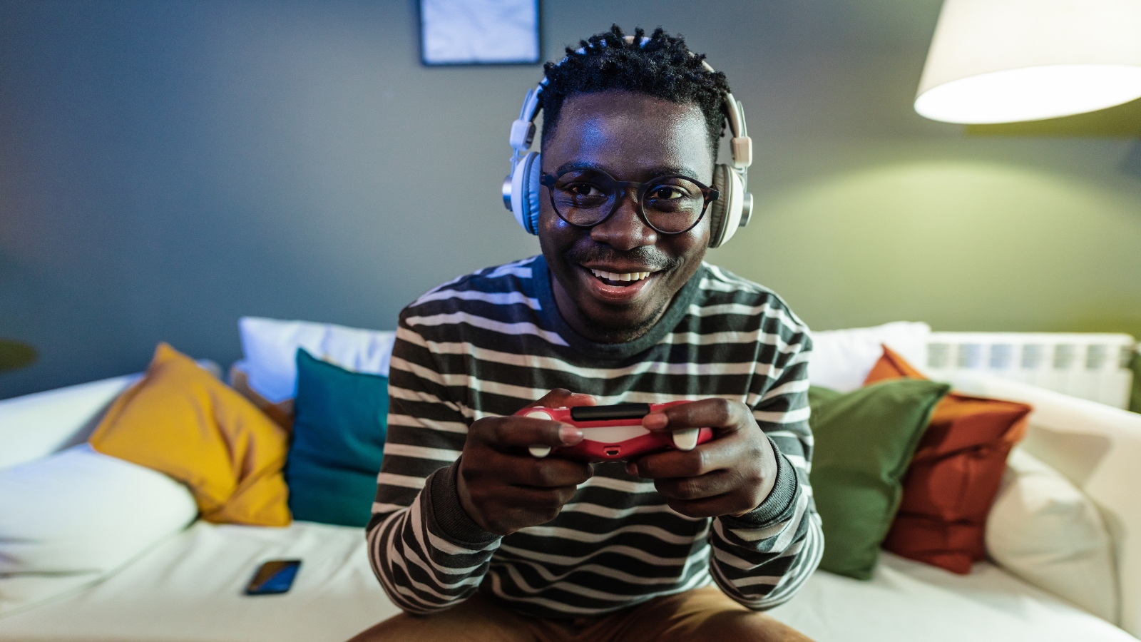 Young African-American man gaming