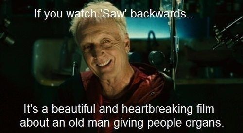 John Kramer watching Saw backwards Meme