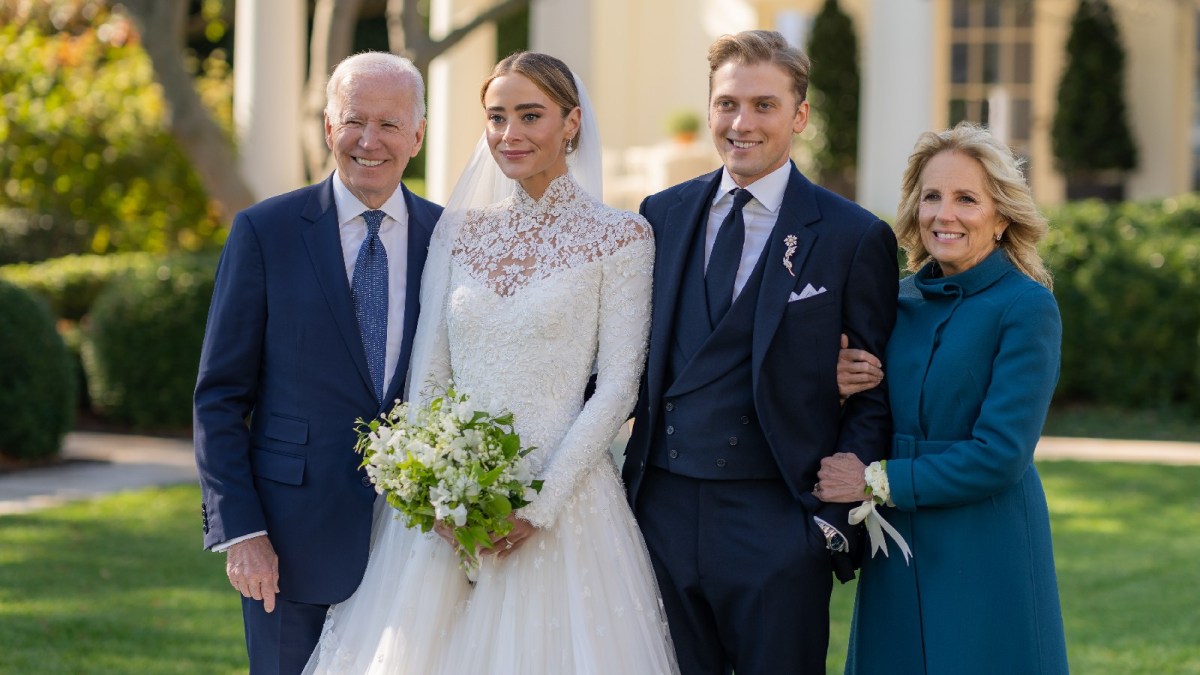 A family gathers on the White House lawn for a wedding.