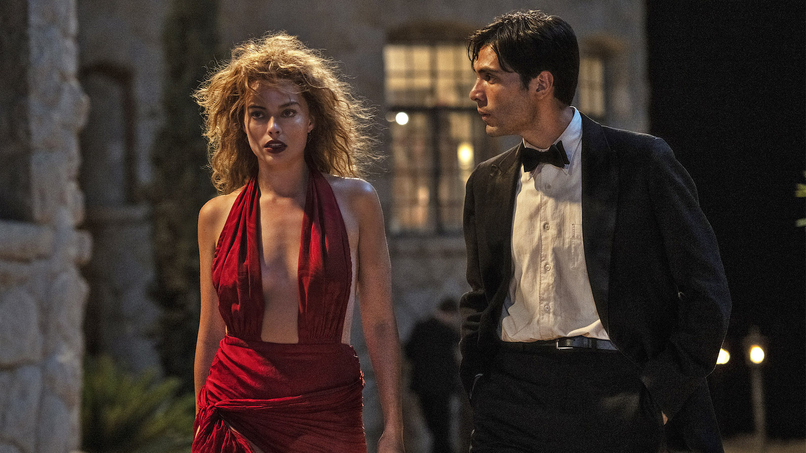 Margot Robbie plays Nellie LaRoy and Diego Calva plays Manny Torres in Babylon from Paramount Pictures.