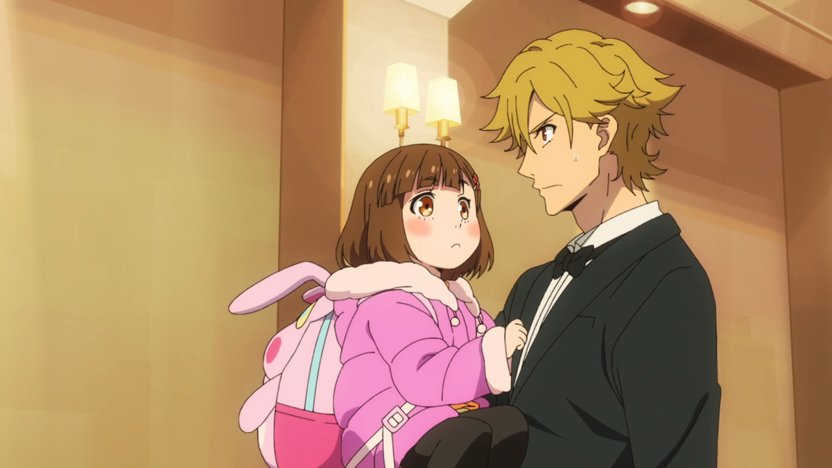 Kazuki holding Miri in episode 1 of Buddy Daddies.