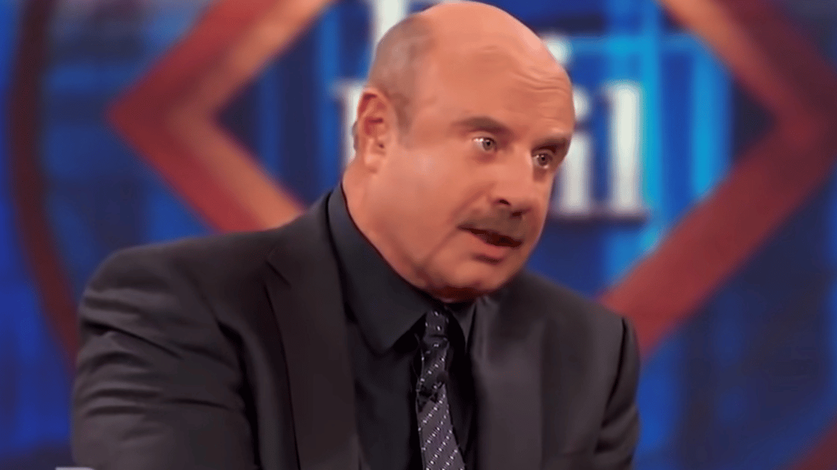 Phil McGraw talking to a guest in an episode of 'Dr. Phil.'