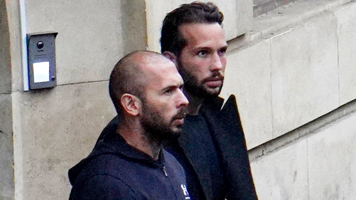 Andrew Tate (L) and Tristan Tate leave the Bucharest Court of Appeal after the hearing on their appeal to the decision of arrest for 30 days, on January 10, 2023 in Bucharest, Romania.