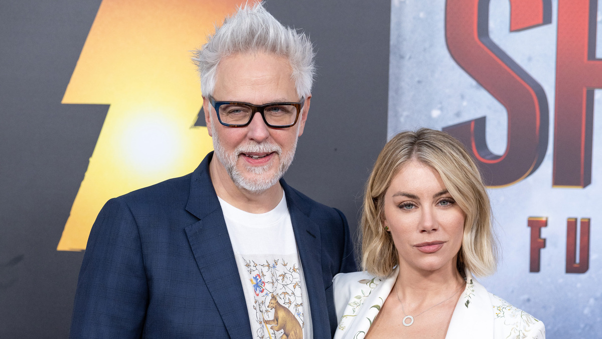 James Gunn (L) and Jennifer Holland attend the Los Angeles Premiere of Warner Bros.' "Shazam! Fury Of The Gods" at the Regency Village Theatre on March 14, 2023