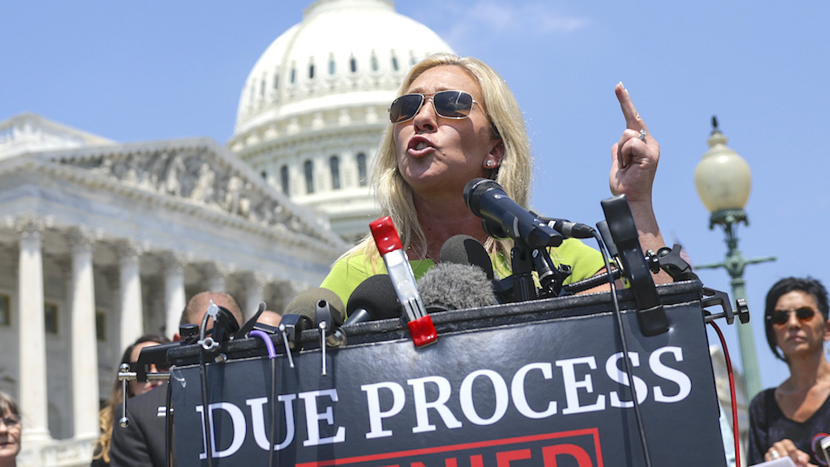 U.S. Rep. Marjorie Taylor Greene (R-GA) speaks during a press conference with the Capitol showing in the background