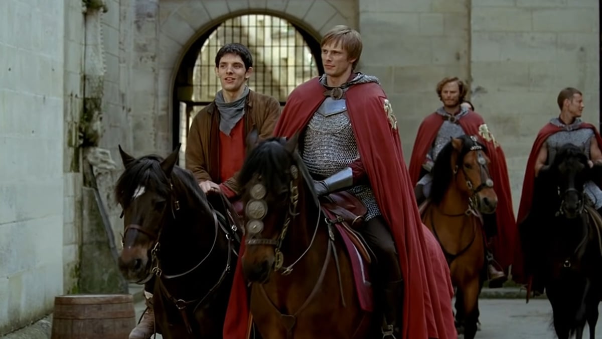Merlin and Arthur ride together in Merlin/ BBC