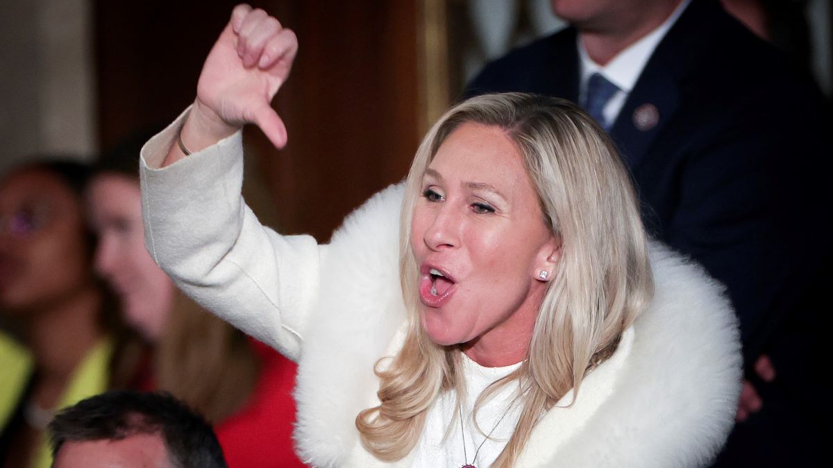 U.S. Rep. Marjorie Taylor Greene (R-GA) gives a thumbs down during President Joe Biden's State of the Union address during a joint meeting of Congress in the House Chamber of the U.S. Capitol on February 07, 2023 in Washington, DC. The speech marks Biden's first address to the new Republican-controlled House.