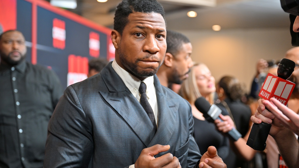 ATLANTA, GEORGIA - FEBRUARY 23: Jonathan Majors attends the "Creed III" HBCU Atlanta Fan Screening at Regal Atlantic Station on February 23, 2023 in Atlanta, Georgia.