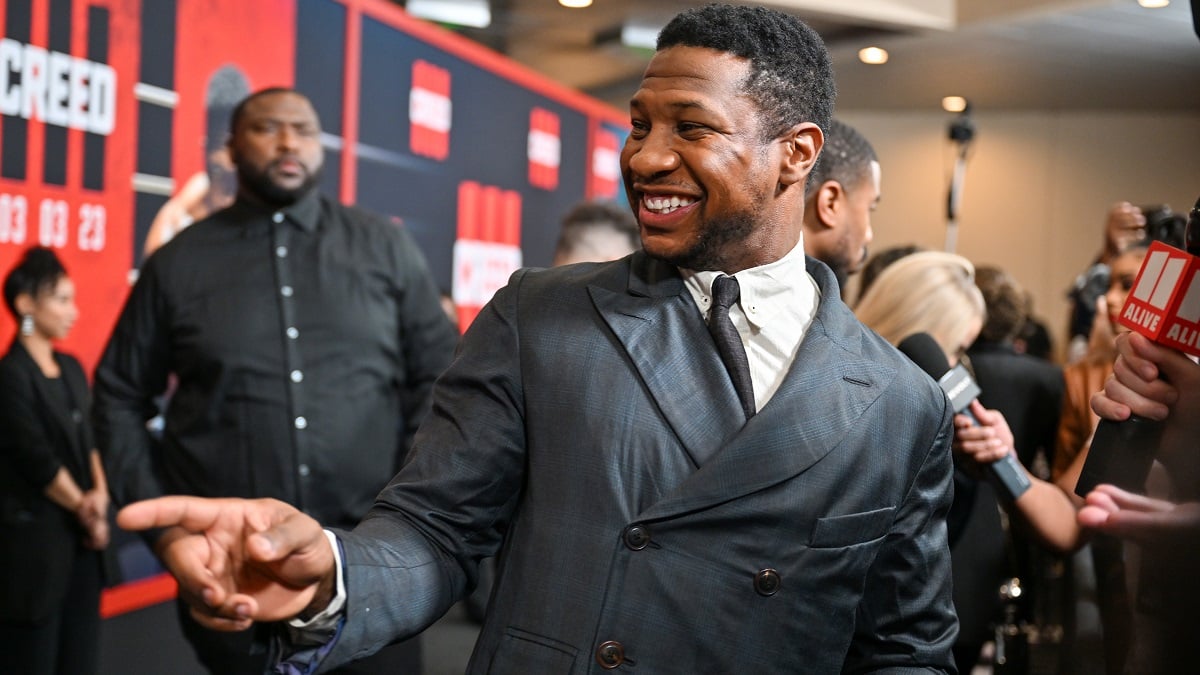 ATLANTA, GEORGIA - FEBRUARY 23: Jonathan Majors attends the "Creed III" HBCU Atlanta Fan Screening at Regal Atlantic Station on February 23, 2023 in Atlanta, Georgia.