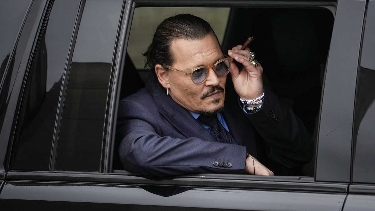 FAIRFAX, VA - MAY 27: Actor Johnny Depp sits in his vehicle as he departs the Fairfax County Courthouse on May 27, 2022 in Fairfax, Virginia. Closing arguments in the Depp v. Heard defamation trial, brought by Johnny Depp against his ex-wife Amber Heard, concluded today and jury deliberations begin. 