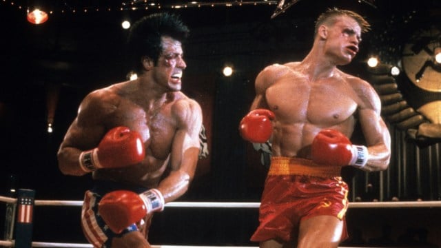Sylvester Stallone punches Dolph Lundgren in a scene from the film 'Rocky IV'