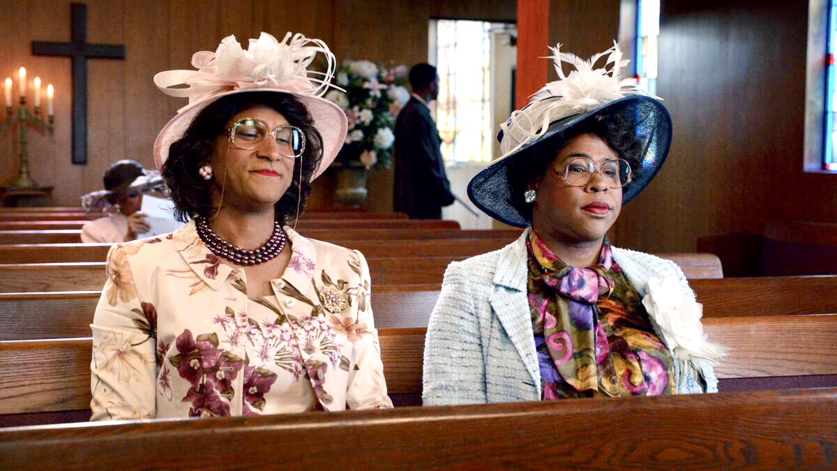 ‘Key and Peele’ actors Keegan Michael Key and Jordan Peele as characters Georgina and Esther sitting in a church.