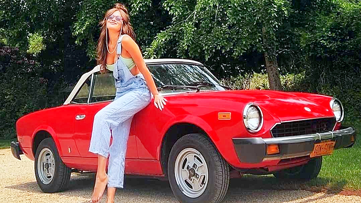 Brynn Whitfield from 'RHONY' season 14 posing with a car