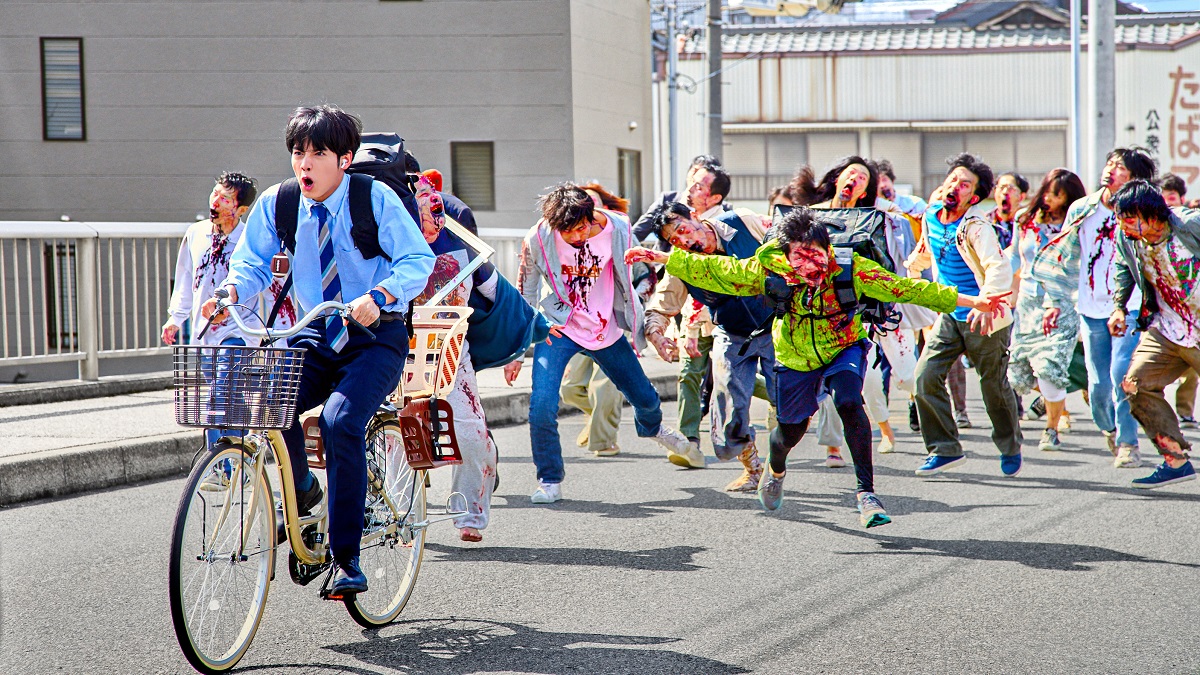 Eiji Akaso as Akira in Zom 100: Bucket List of the Dead