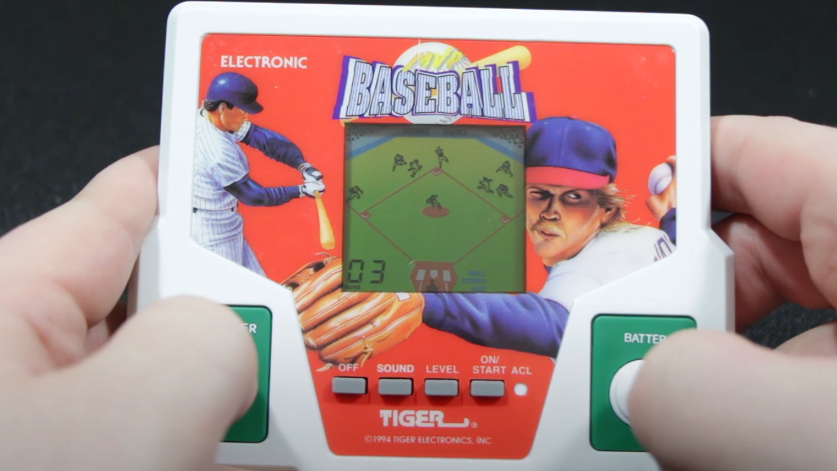 A Tiger Electronics Baseball game being played