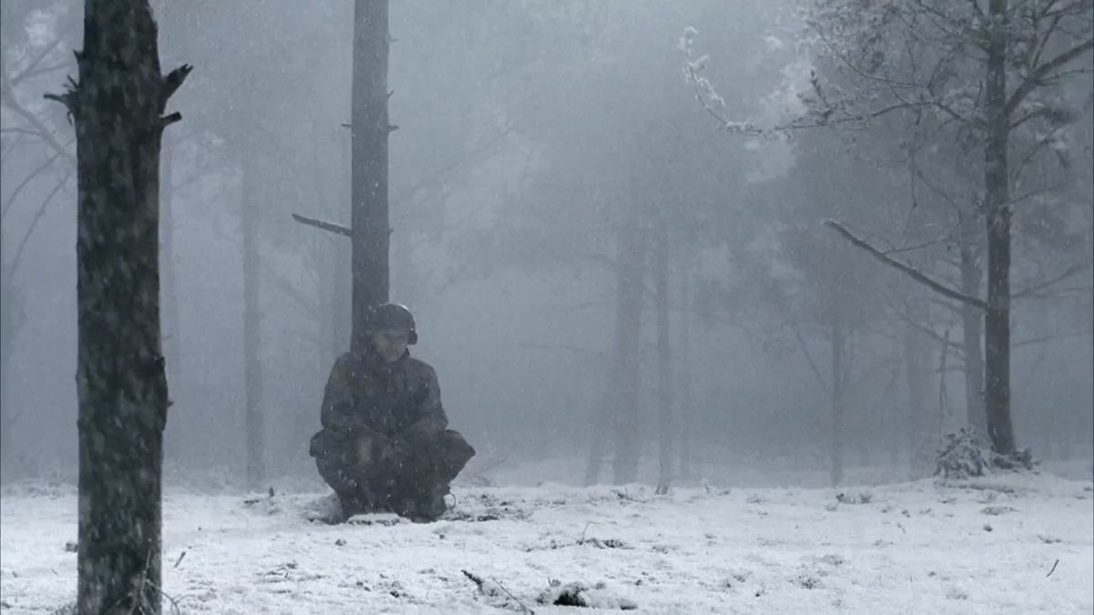 Soldier sitting in the snow