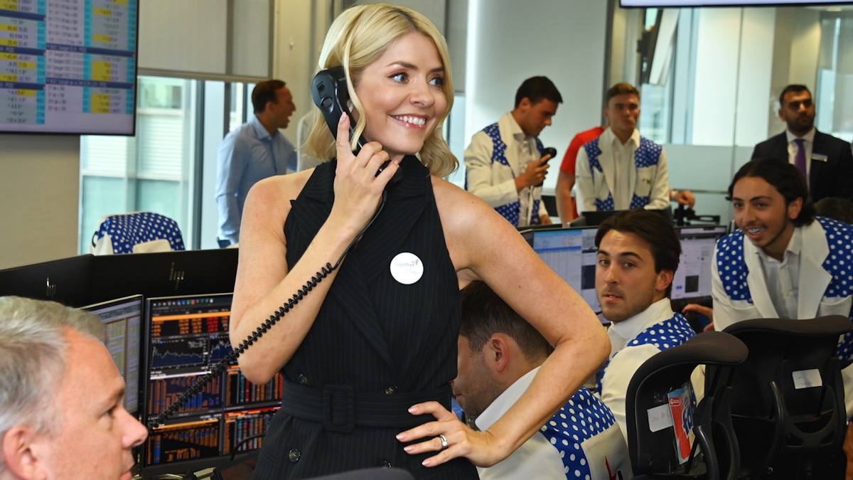 LONDON, ENGLAND - SEPTEMBER 11: Holly Willoughby (C) and BGC traders attend the BGC Group Charity Day on behalf of Together for Short Lives, raising millions for good causes in memory of BGC's colleagues lost on 9/11, on September 11, 2023 in London, England.