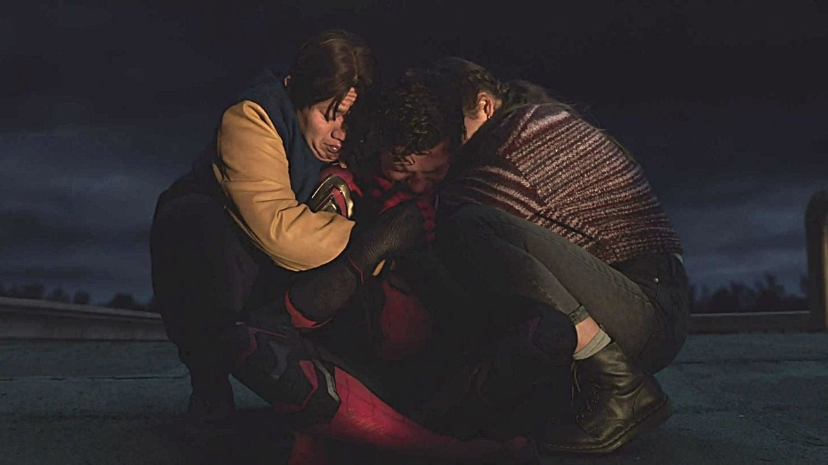 Ned (L), Peter (C), MJ (R) share an emotional hug in Marvel Studios' 'Spider-Man: No Way Home'.