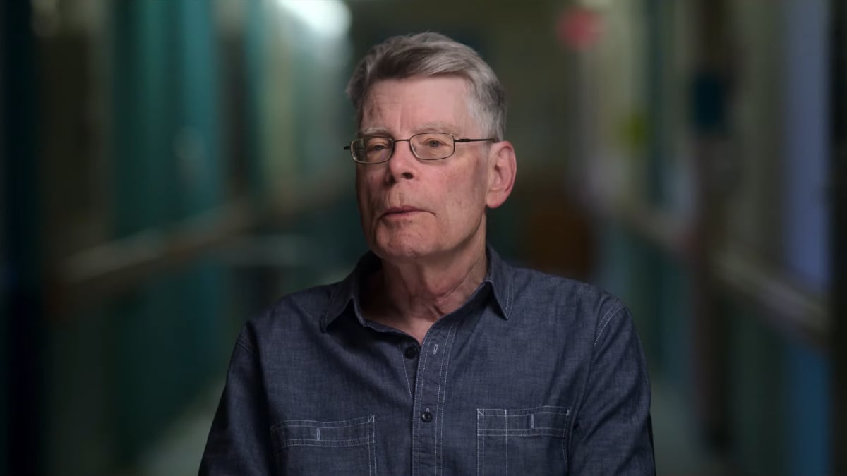 Stephen King looks pensively into the distance.