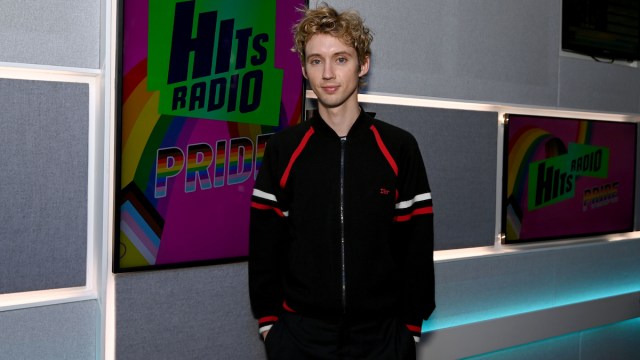 Troye Sivan poses for a photograph during his visit to Hits Radio at 1 Golden Square on October 05, 2023 in London, England.