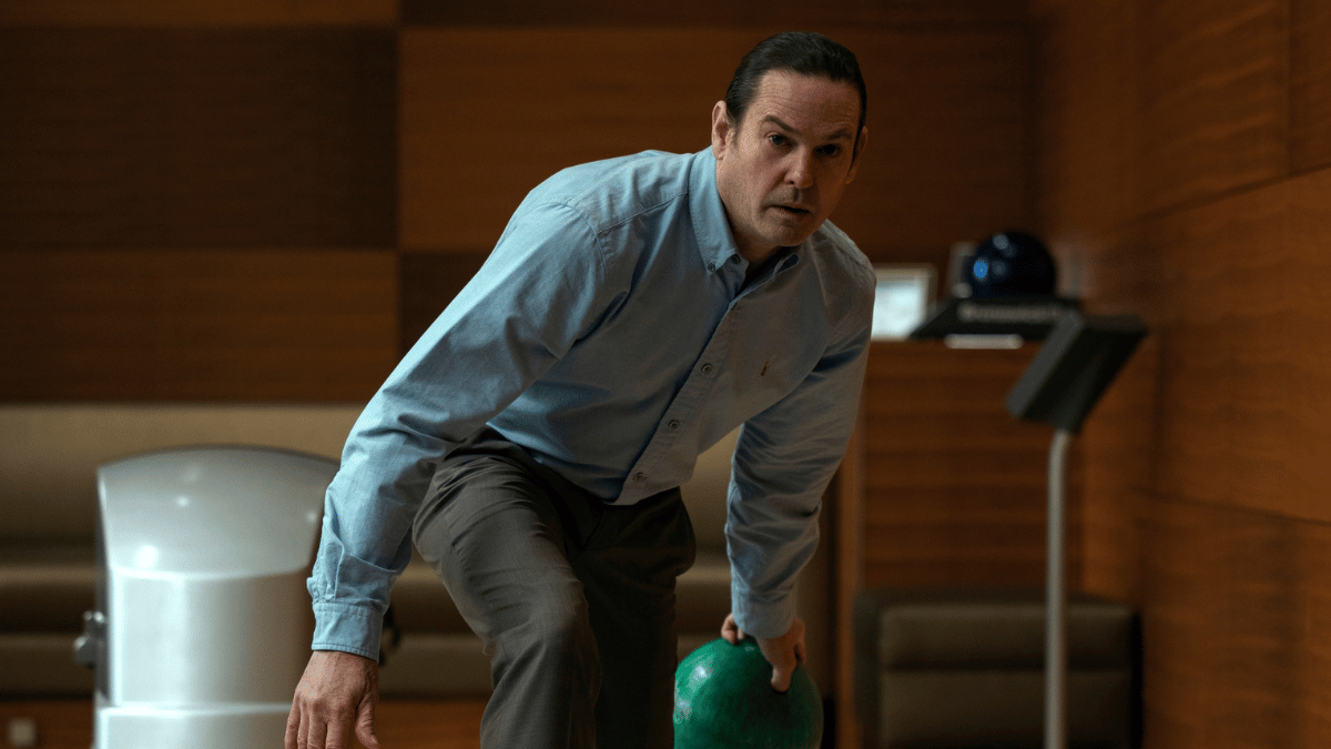 Frederick Usher (Henry Thomas) prepares to roll a bowling ball in 'The Fall of the House of Usher'