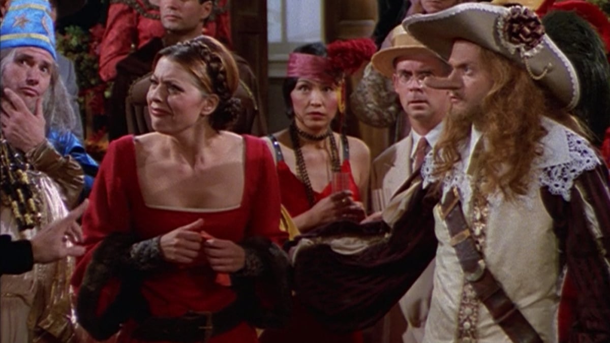 Niles and Daphne attend a Halloween costume party in 'Frasier.'