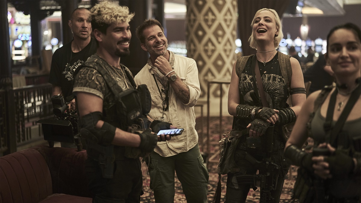 ARMY OF THE DEAD - (L-R) RAÙL CASTILLO as MICKEY GUZMAN, ZACK SNYDER (DIRECTOR, PRODUCER, WRITER), NORA ARNEZEDER as LILLY (THE COYOTE) and ANA DE LA REGUERA as CRUZ in ARMY OF THE DEAD.