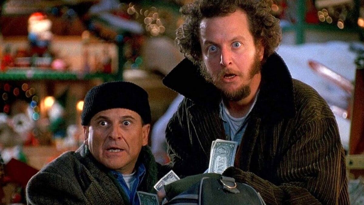 Harry and Marv look stunned as they are caught robbing Duncan's Toy Chest red-handed in Home Alone 2: Lost in New York. 