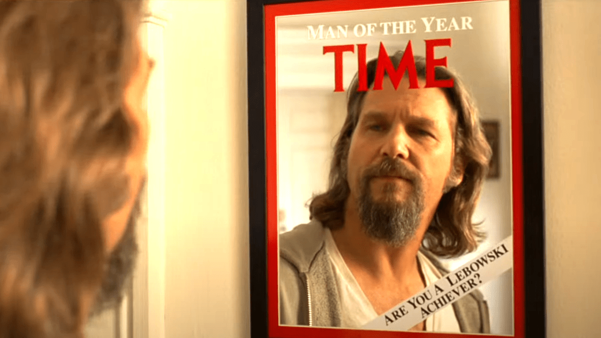 Jeff Bridges as Jeffrey Lebowski, looking at himself in a Time Magazine cover mirror.