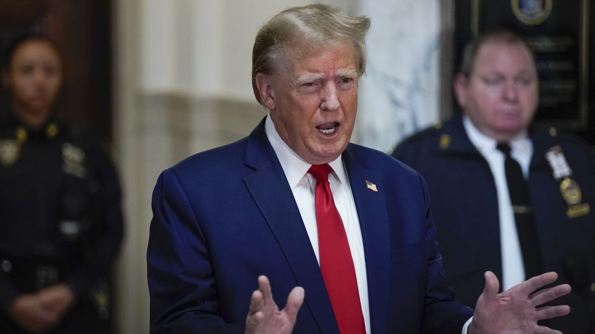 Former U.S. President Donald Trump speaks after arriving for his civil business fraud trial in New York State Supreme Court on December 7, 2023 in New York City. Trump's civil fraud trial alleges that he and his two sons Donald Trump Jr. and Eric Trump conspired to inflate his net worth on financial statements provided to banks and insurers to secure loans. New York Attorney General Letitia James has sued seeking $250 million in damages. (Photo by Eduardo Munoz Alvarez-Pool/Getty Images)