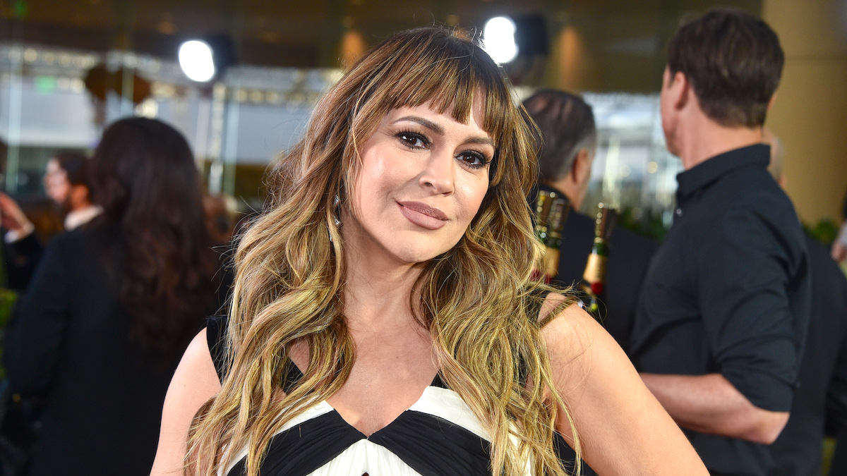 Alyssa Milano in a black and white dress at the 81st Golden Globe Awards