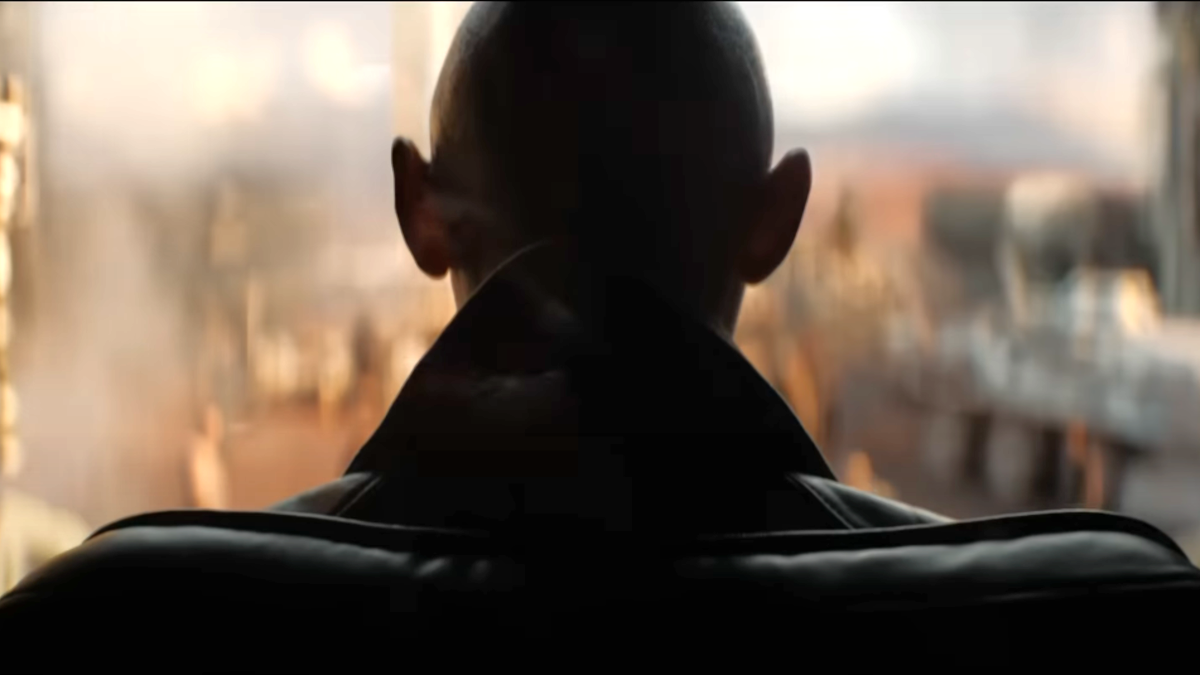 A bald-headed person looks over the wastelands in the Deadpool & Wolverine trailer