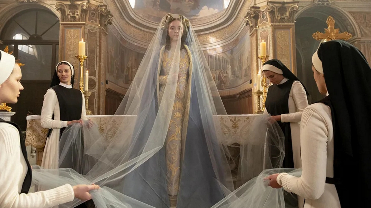 Sydney Sweeney is surrounded by nuns that dress her as a saint in the horror movie Immaculate