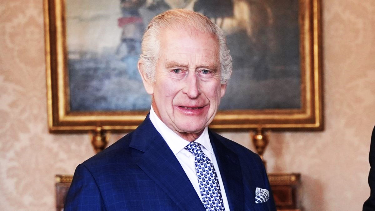 King Charles III (left) is presented with the first bank notes featuring his portrait from the Bank of England Governor Andrew Bailey and Sarah John, the Bank of England's Chief Cashier, at Buckingham Palace, April 9, 2024 in London, England. (Photo by Yui Mok - WPA Pool/Getty Images)