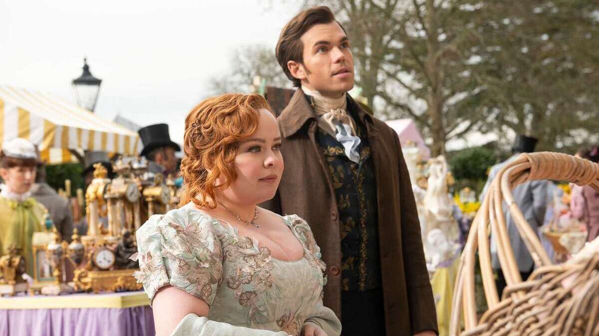 Penelope Featherington (Nicola Coughlan) and Colin Bridgerton (Luke Newton) attend a fair together in Bridgerton season 3