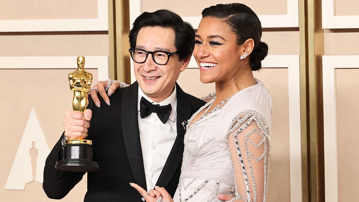 Ke Huy Quan, winner of Best Actor in a Supporting Role award for ‘Everything Everywhere All at Once,’ and Ariana DeBose pose in the press room during the 95th Annual Academy Awards at Ovation Hollywood on March 12, 2023 in Hollywood, California.