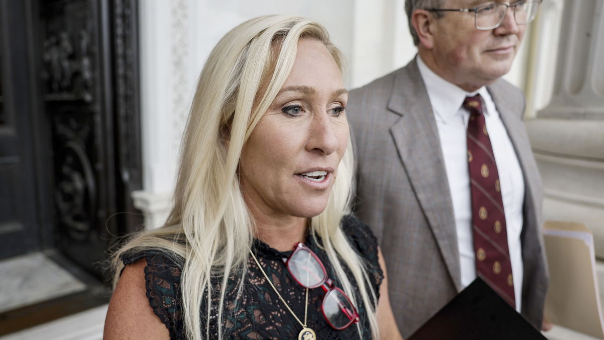 Rep. Marjorie Taylor Greene (R-GA), and Rep. Thomas Massie (R-KY), speak to members of the press while exiting the U.S. Capitol after introducing a motion to vacate on the floor of the House of Representatives seeking to remove Speaker of the House Mike Johnson (R-LA) from his leadership position on May 8, 2024 in Washington, DC. The House voted 359 to 43 to table the motion to vacate.