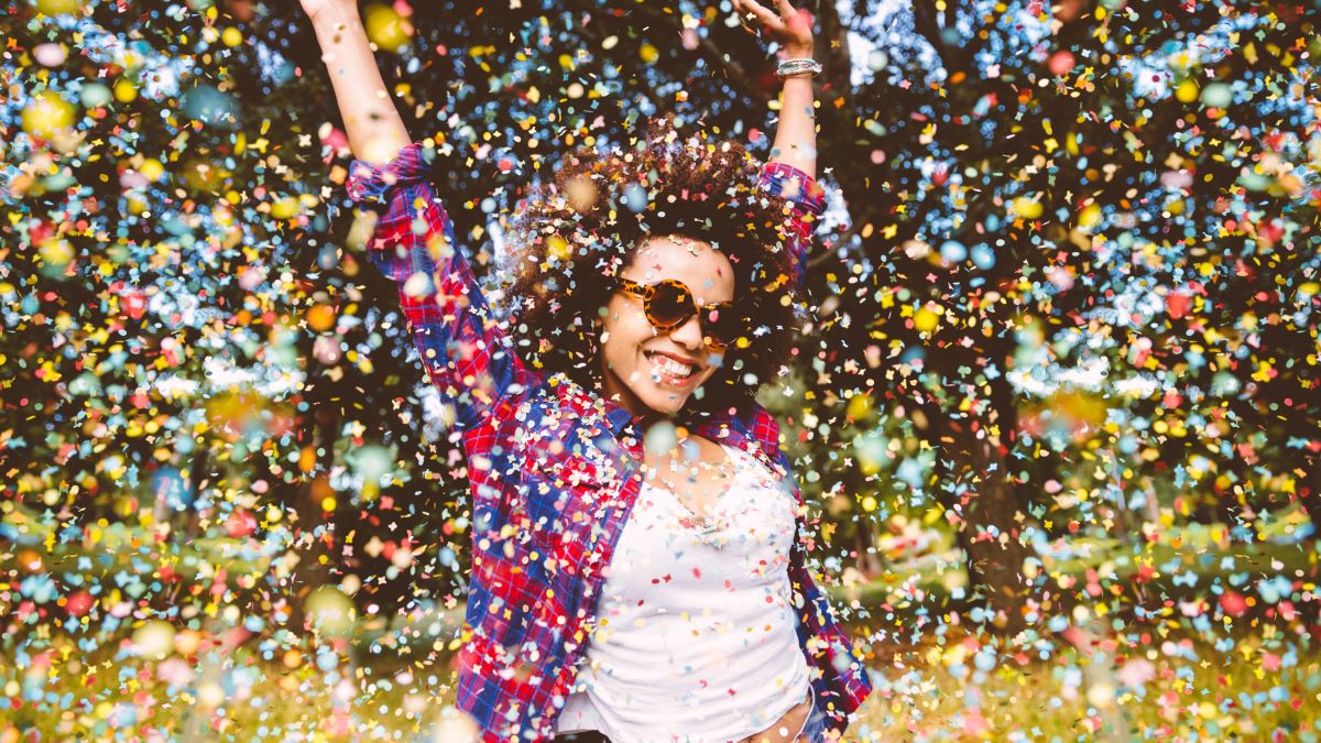 Hipster enjoying confetti