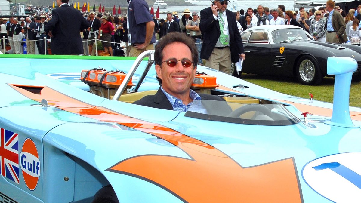 Jerry Seinfeld drives his vintage Porsche 917, made famous by the movie Le Mans, in Monterey Saturday, August 15, as part of the Monterey Historic car event. (Photo by Axel Koester/Corbis via Getty Images)